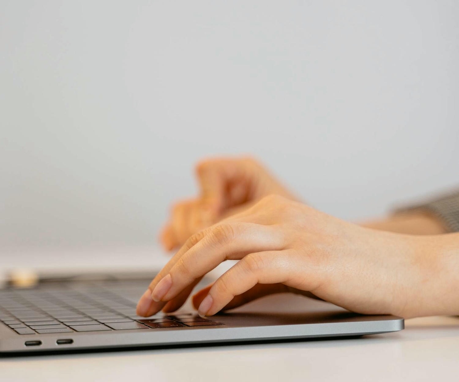 A Person Using a Laptop